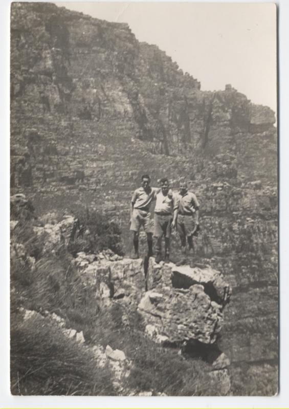 Petty Officer David Perkins (on right) with fellow Leading Stokers Micky Booth and Micky Barrett on Table Mountain Capetown on 24 December 1939\n