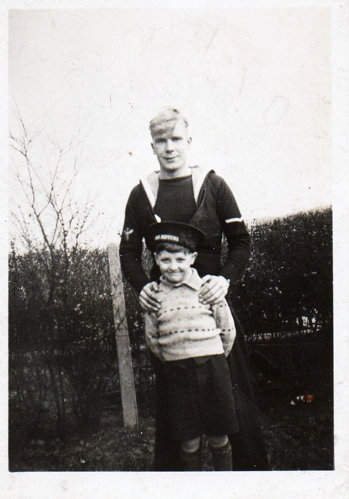 The photo of George and Brian Denial The photo of George and Brian Denial
