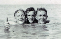 Cyril Hunter is in the centre swimming with his friends Harry Jones on left Edwin Gray on right
